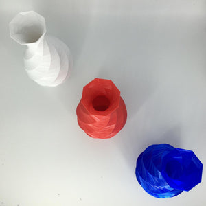 Riskable's Twisted Low-Poly Vase STL and GreenGate3D's Clear PETG filament